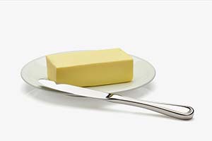 avoid-trans-fats-300x200 Stick of butter on plate