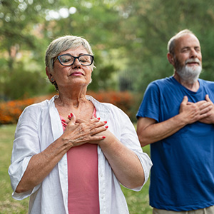 6-gratitude-adobestock_1545437155_300x300 Adults embracing during community gathering